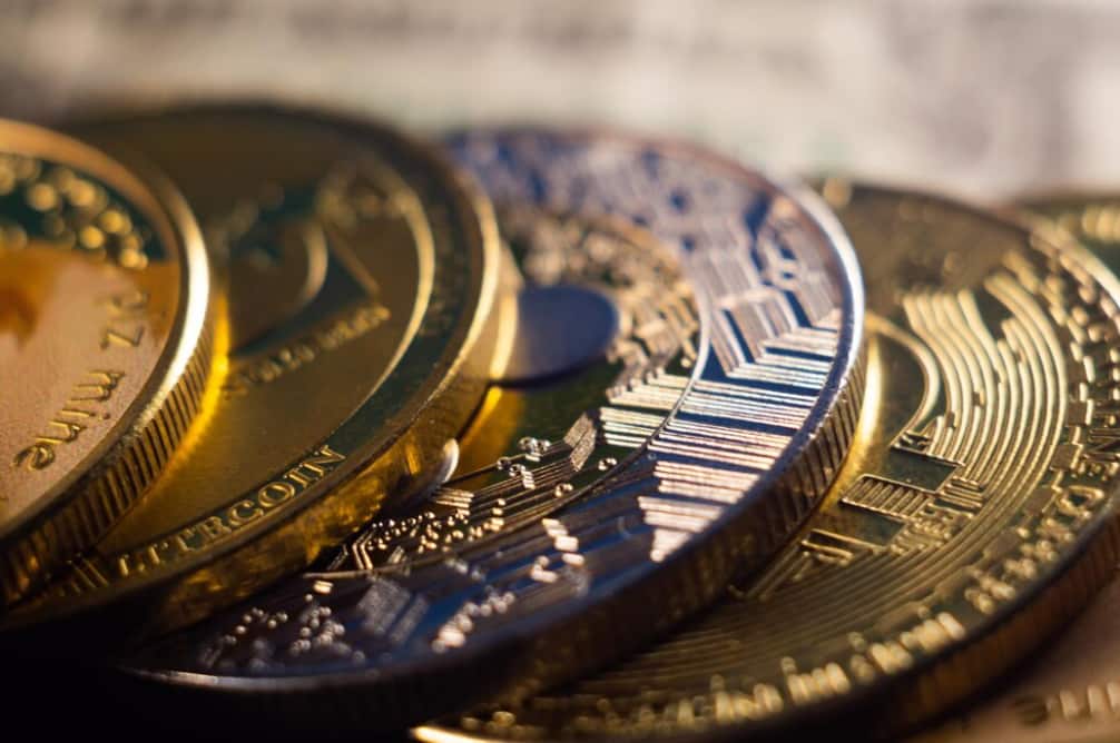 Close-up of various golden cryptocurrency coin